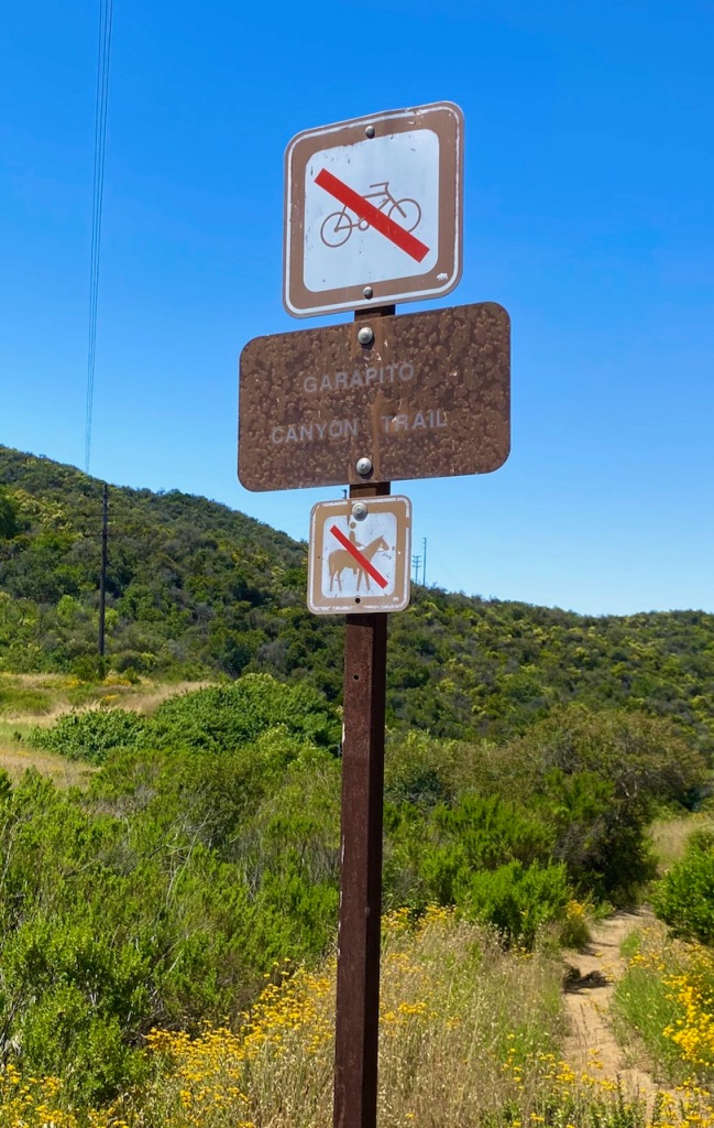 The Garapito Canyon Trail sign at the Marvin Braude Mulholland Gateway Park in Tarzana, CA.